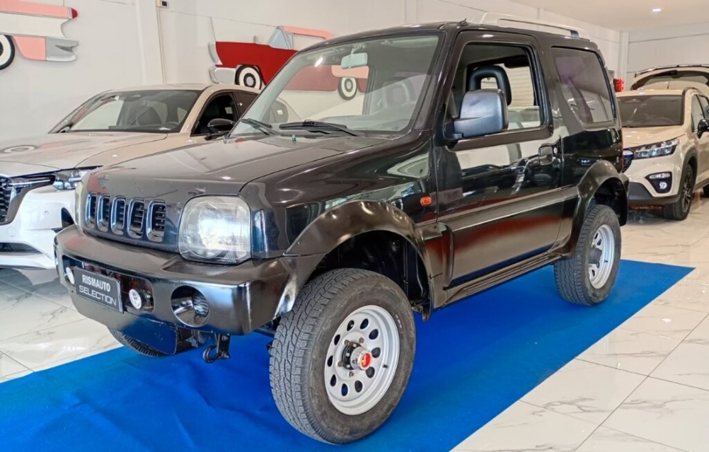 SUZUKI Jimny 1.3i 16V cat 4WD JLX